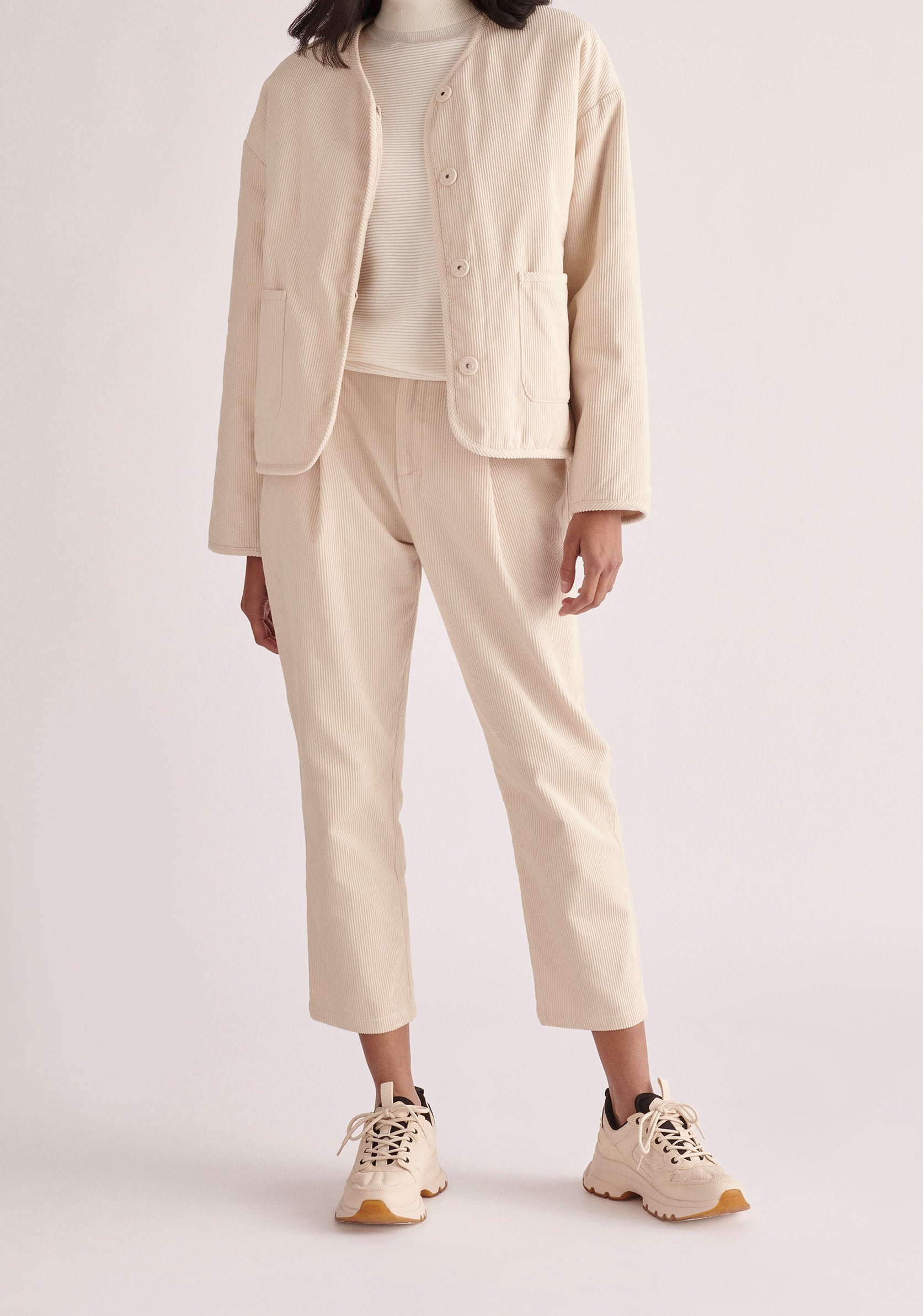 Paisie Pleated Corduroy Trousers in Cream