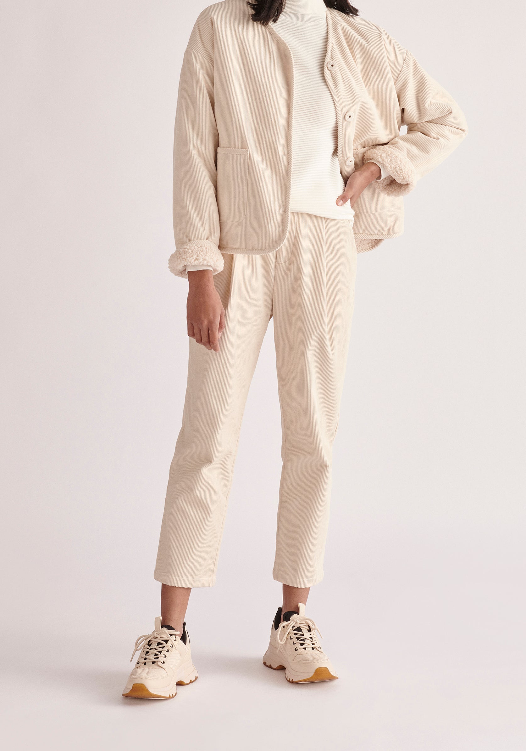 Paisie Pleated Corduroy Trousers in Cream