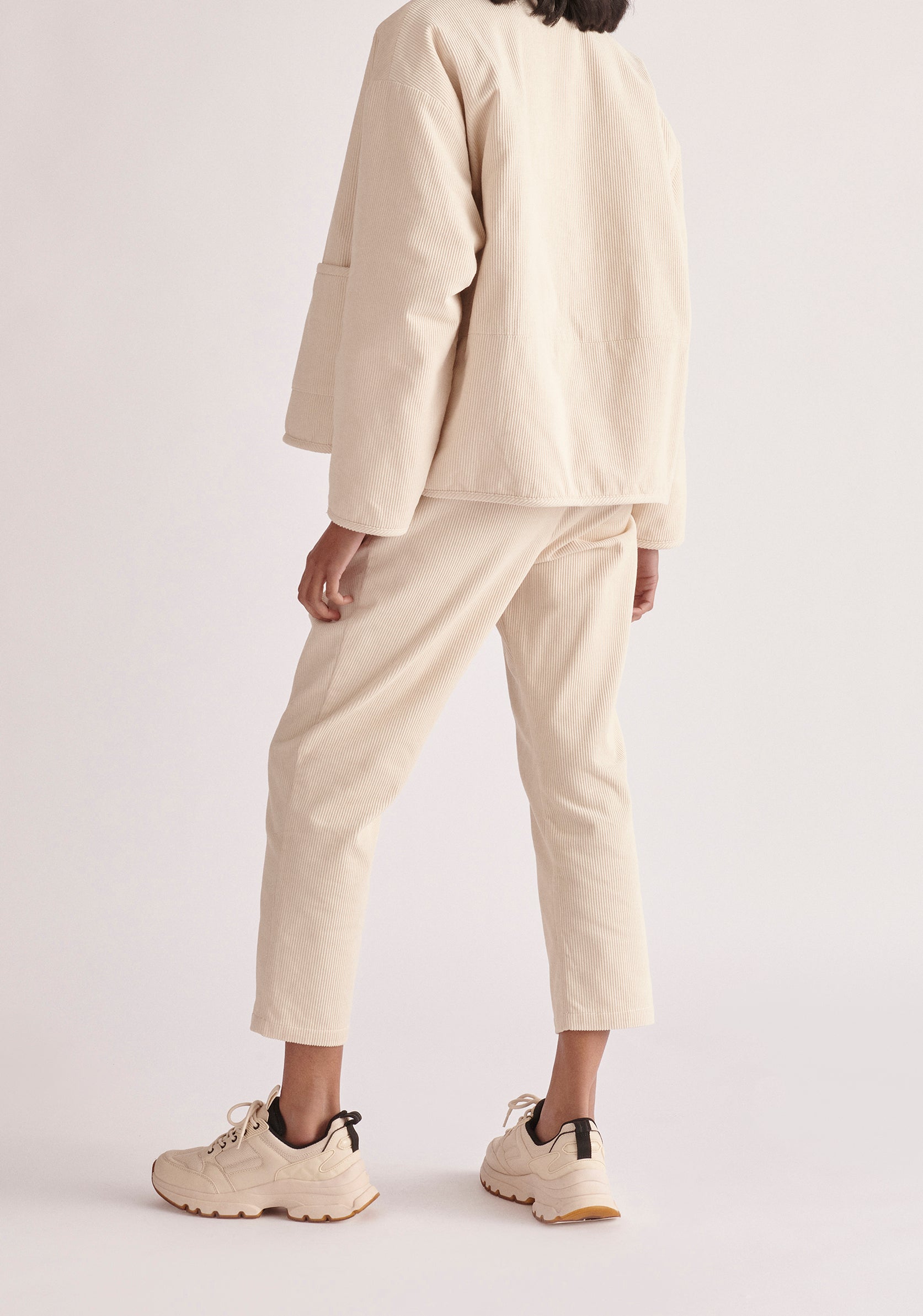 Paisie Pleated Corduroy Trousers in Cream Back