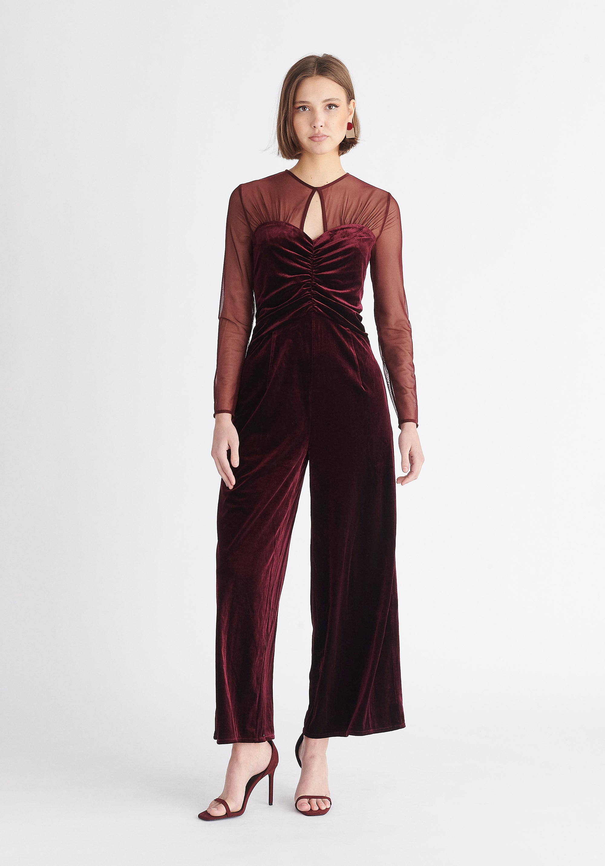 Paisie Sheer Sleeve Velvet Jumpsuit in Purple