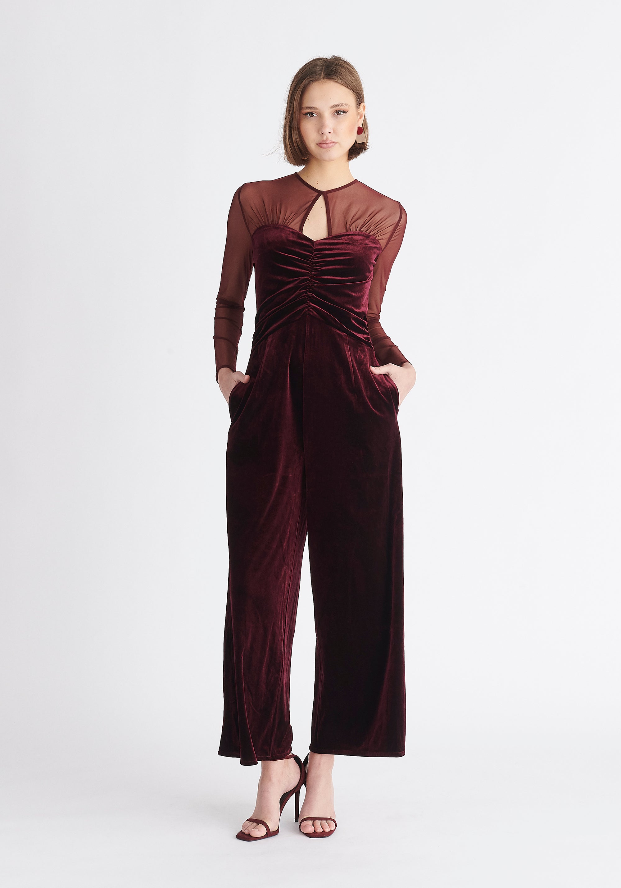 Paisie Sheer Sleeve Velvet Jumpsuit in Purple