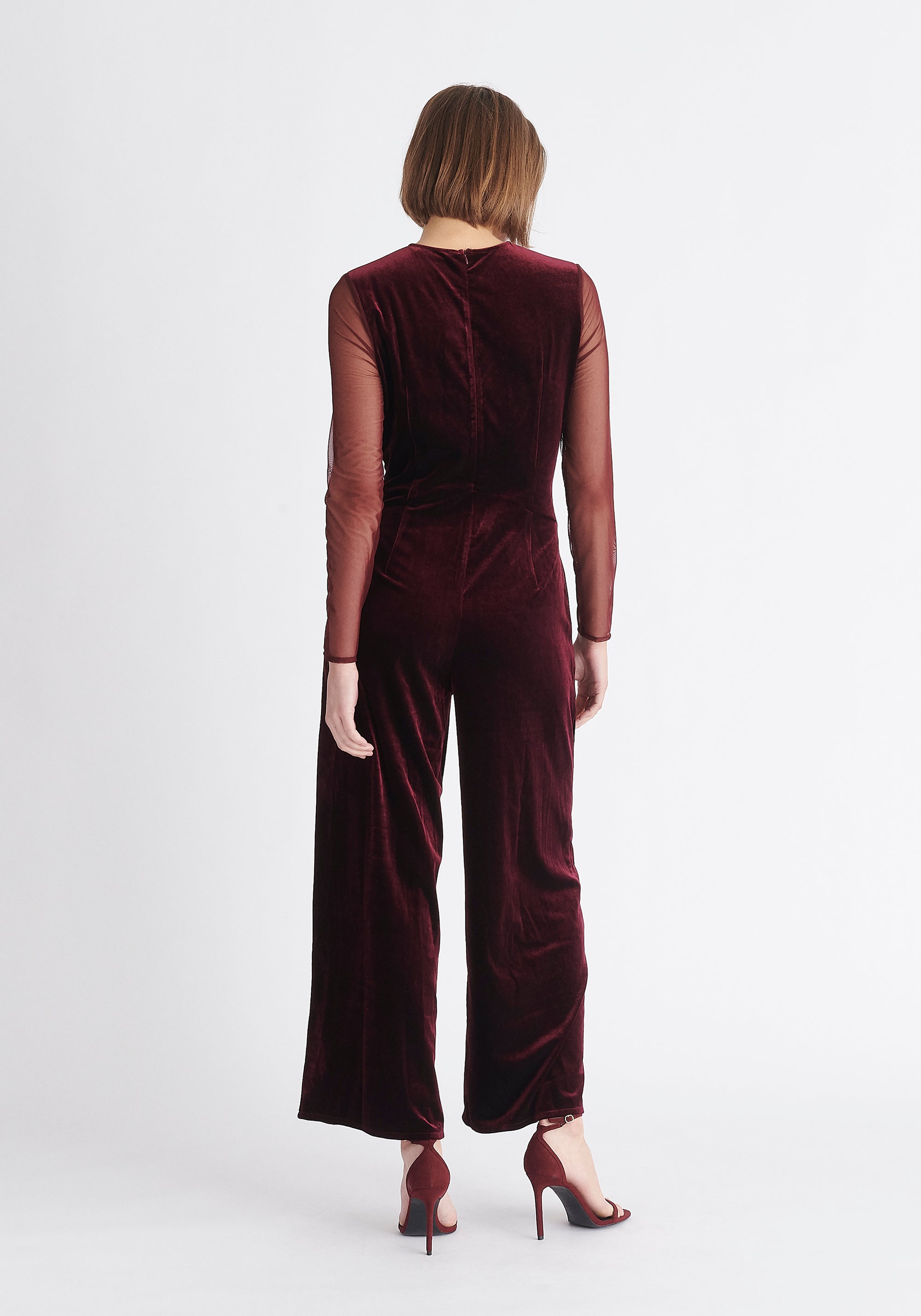 Paisie Sheer Sleeve Velvet Jumpsuit in Purple Back