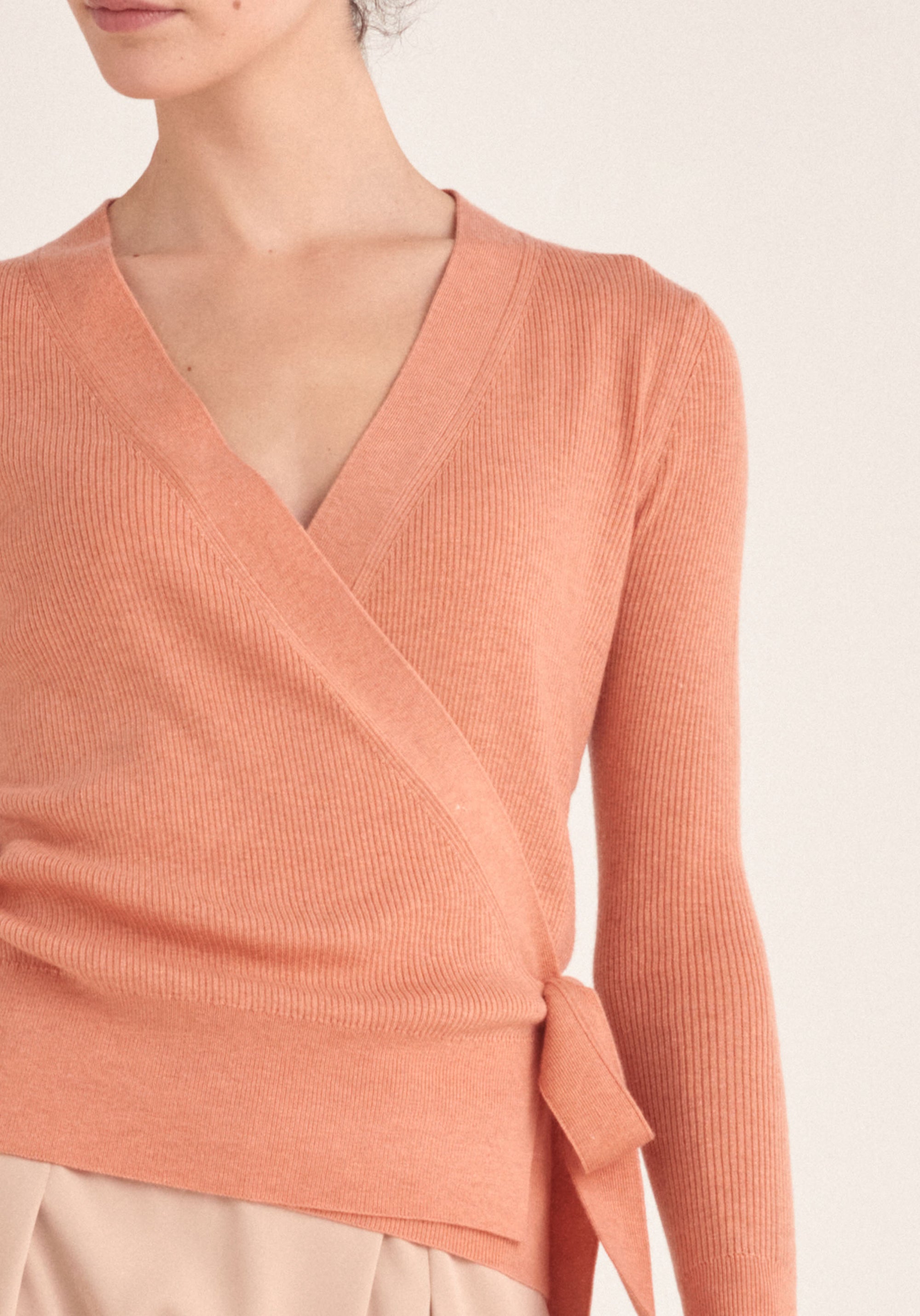 Paisie Ribbed Wrap Side Tie Top in Coral Close Up