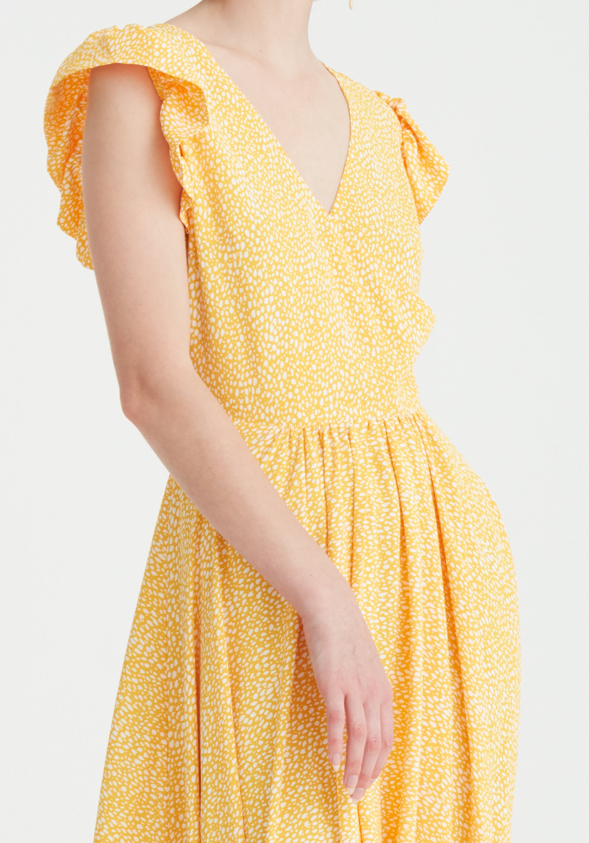 Paisie Asymmetric Hem Maxi Dress in Yellow and White Close Up