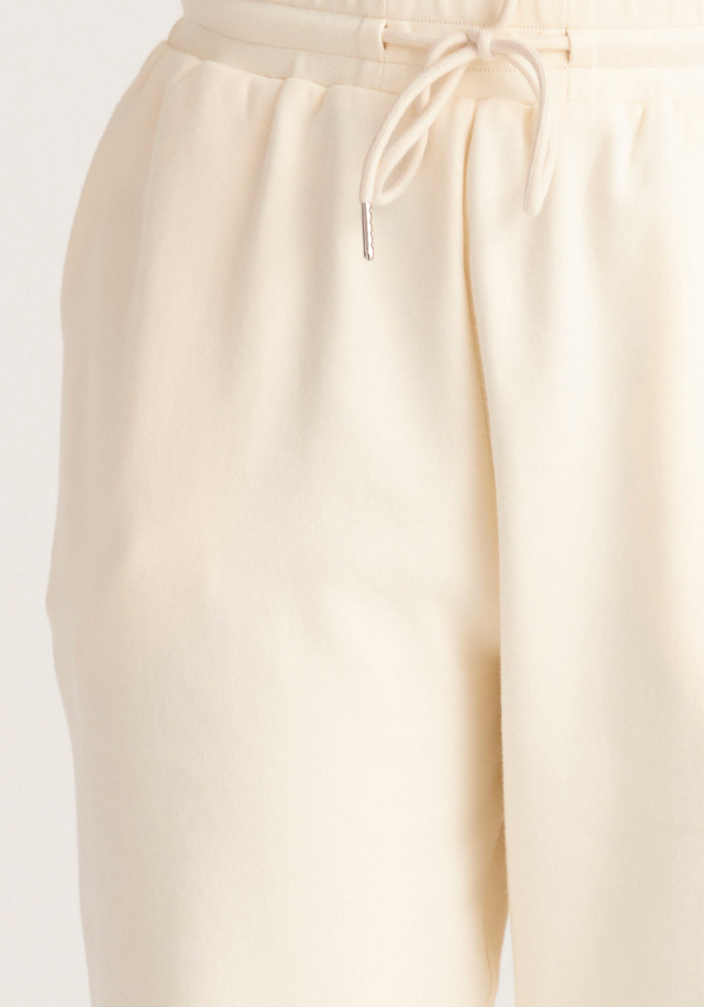 Paisie High Rise Cotton Joggers in Cream Close Up