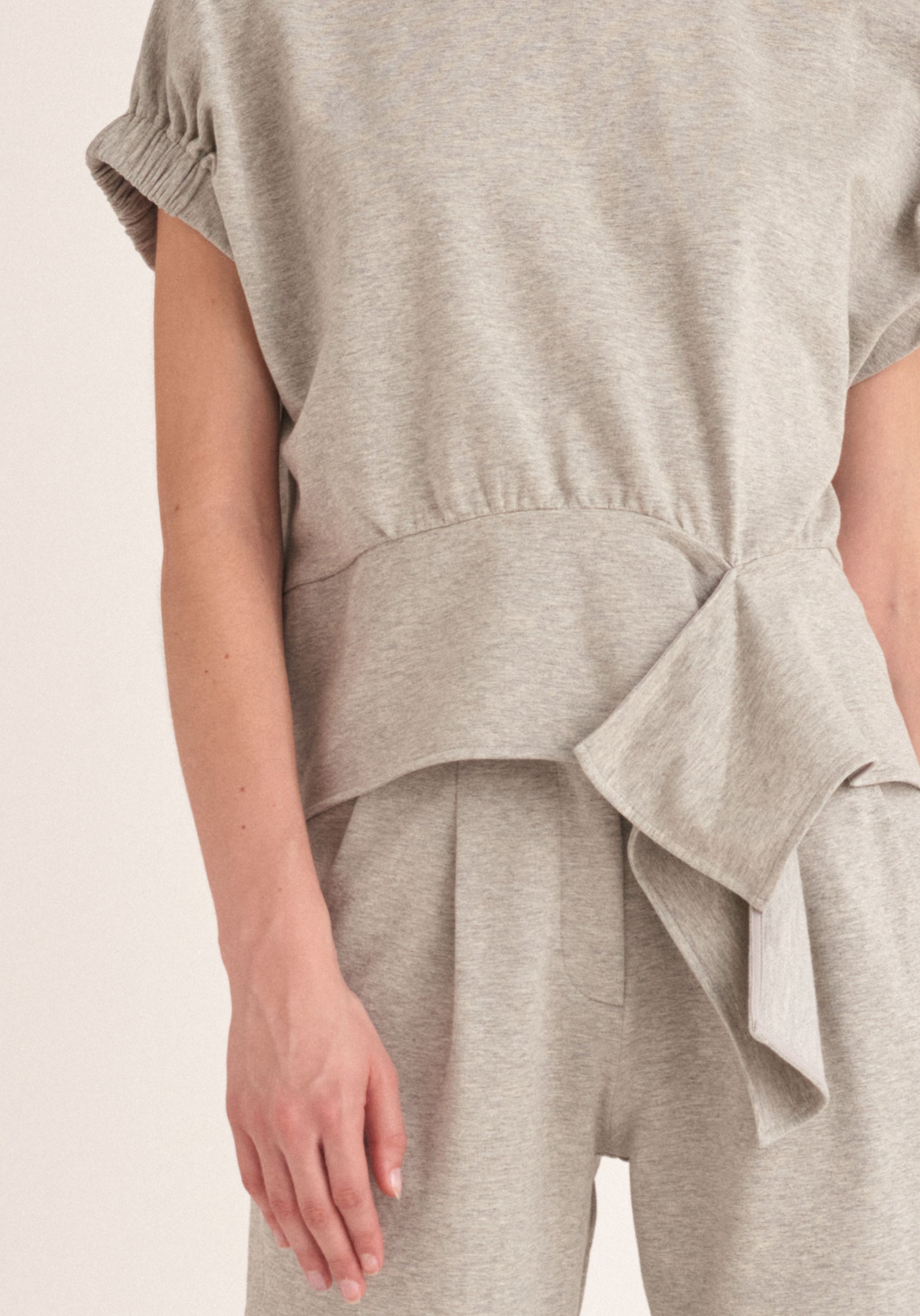 Paisie Short Sleeve Sweatshirt with Waist Detail in Light Grey Close Up