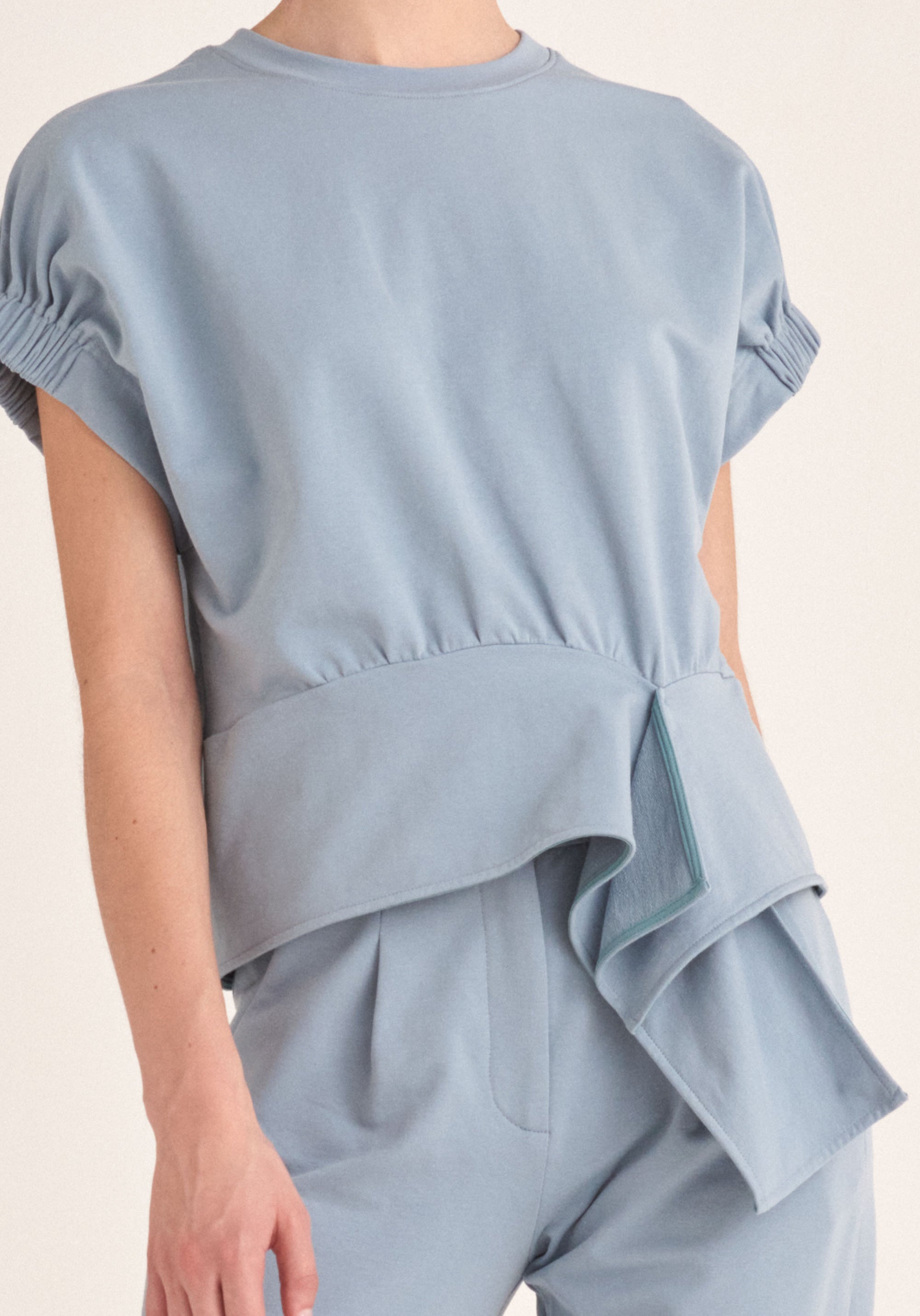 Paisie Short Sleeve Sweatshirt with Waist Detail in Light Blue Close Up