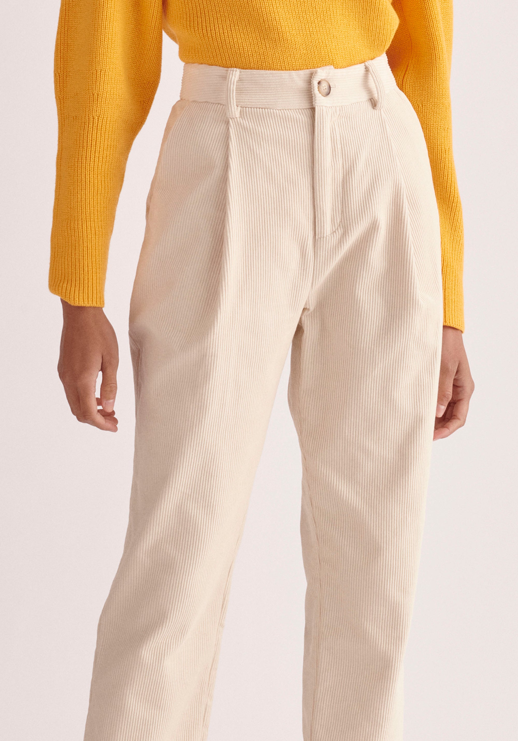 Paisie Pleated Corduroy Trousers in Cream Close Up