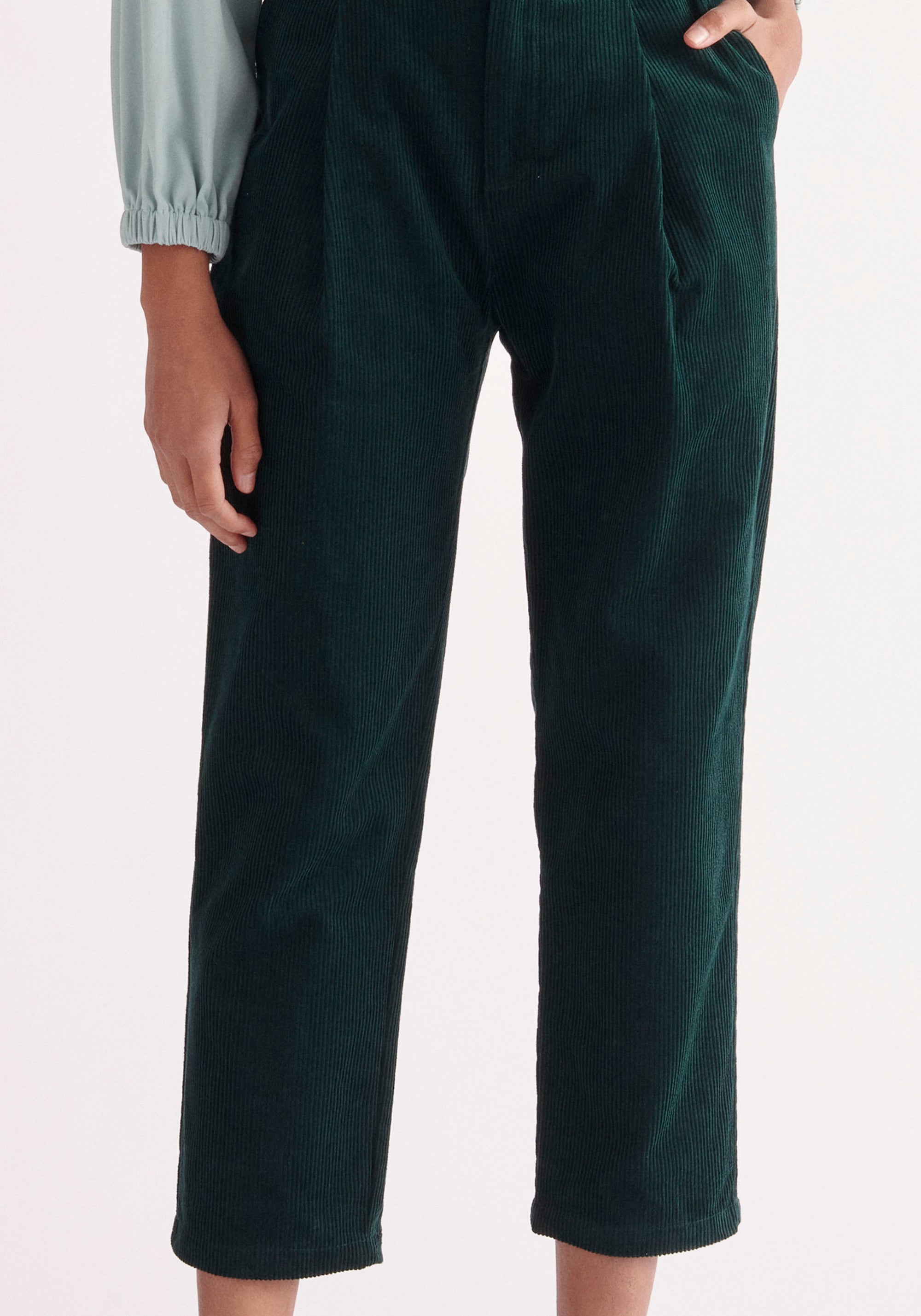 Paisie Pleated Corduroy Trousers in Dark Green Close Up