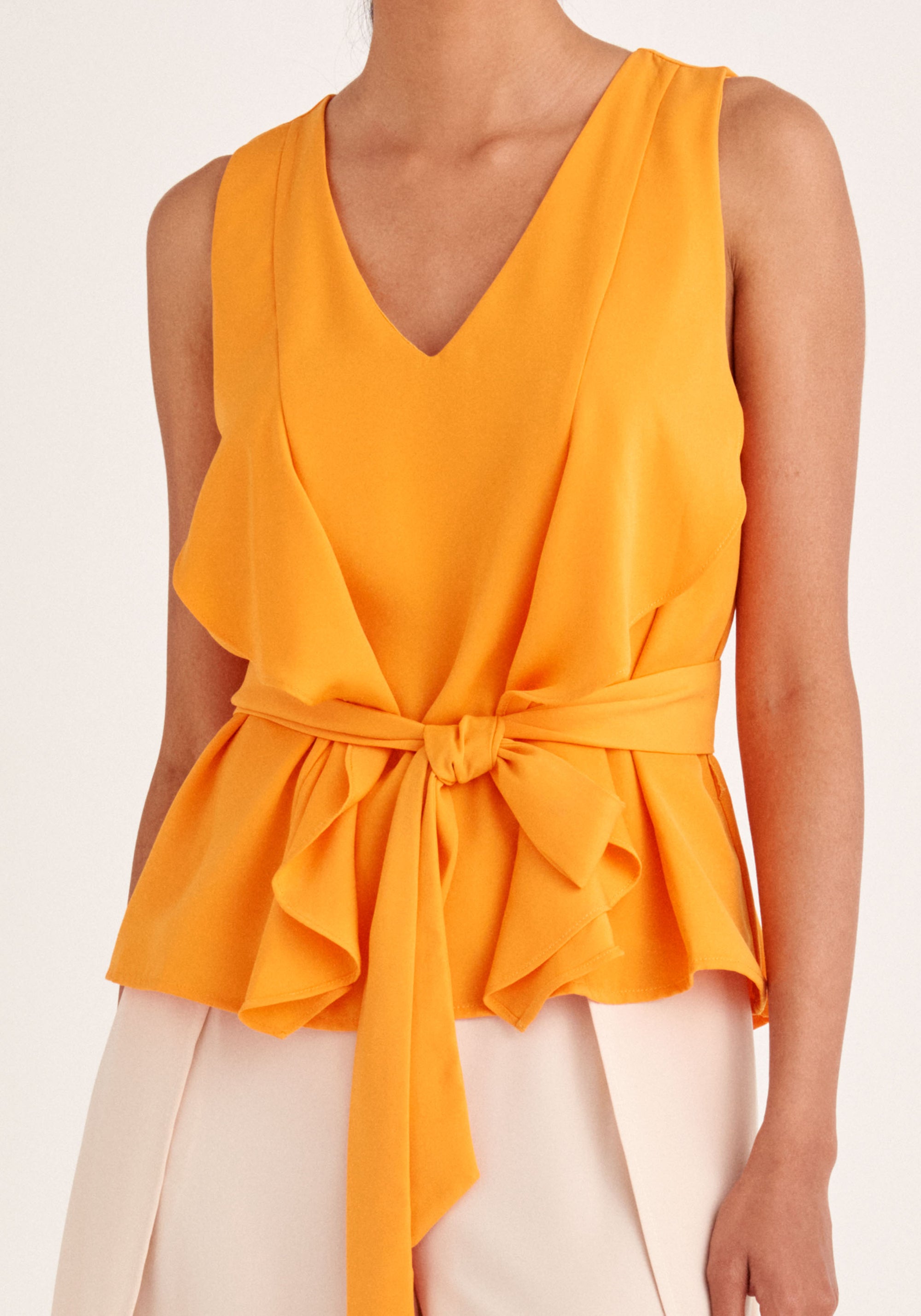 Paisie Sleeveless Frilled V-Neck Blouse in Orange Close Up