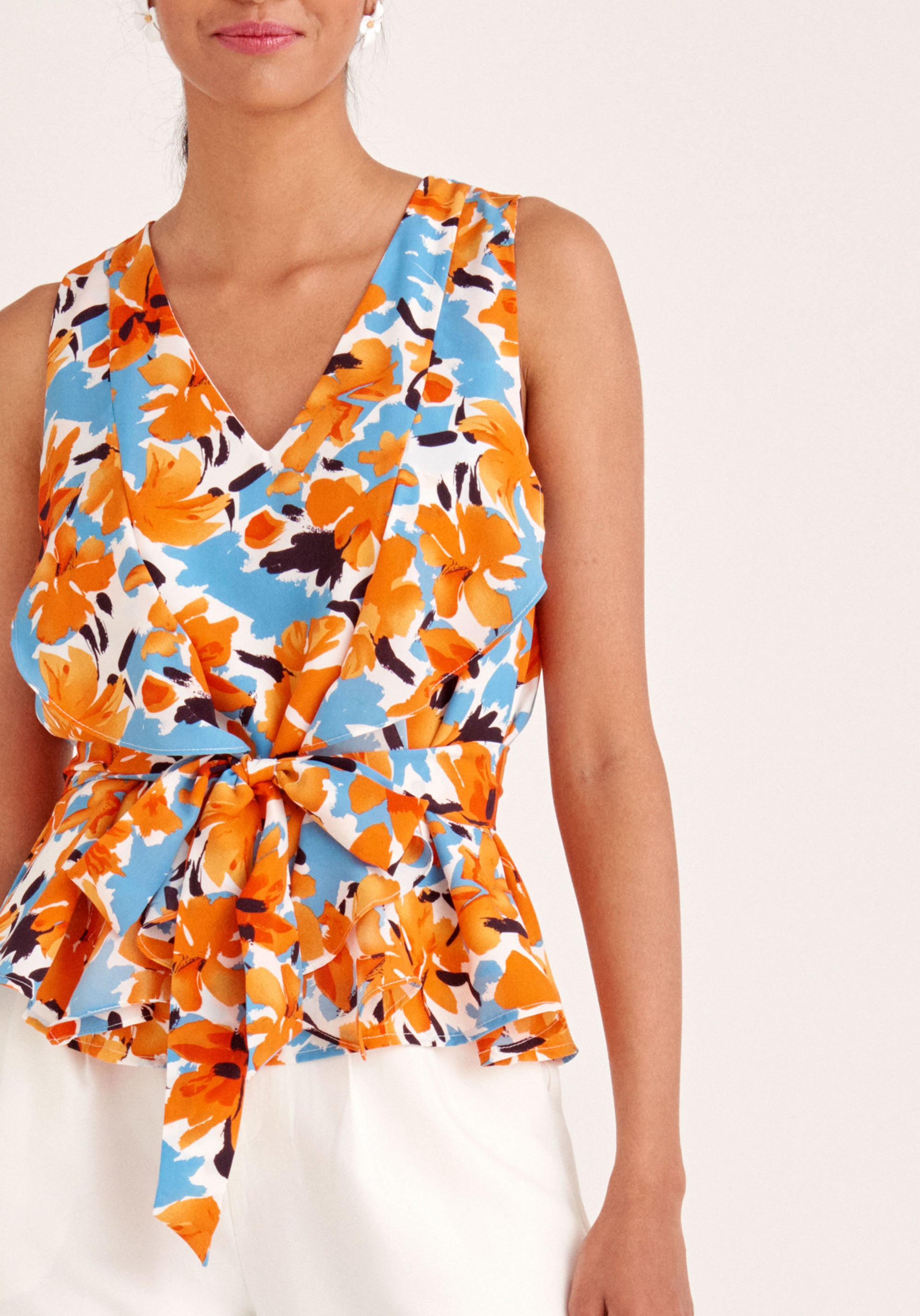 Paisie Floral Sleeveless Frilled V-Neck Blouse in Orange Close Up