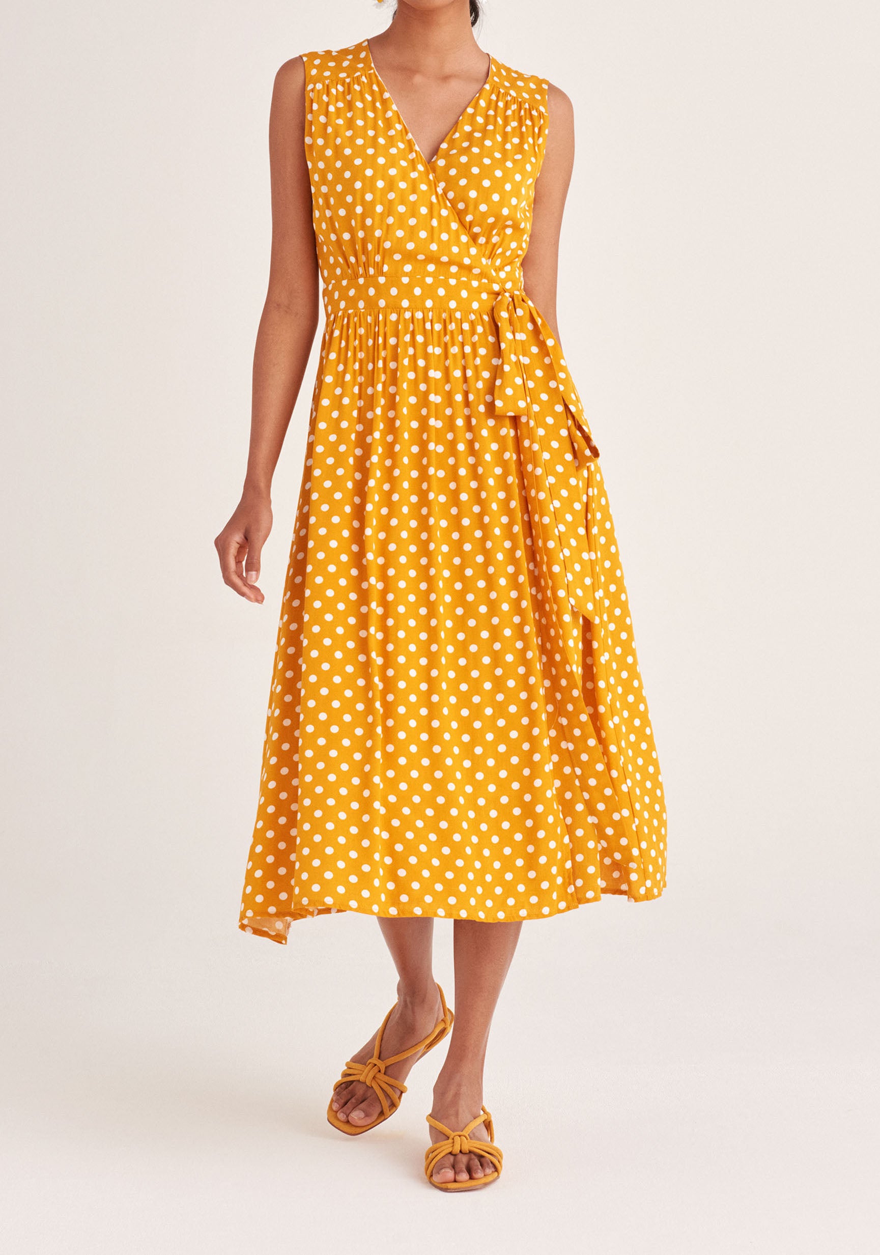 Paisie Sleeveless Polka Dot Wrap Dress in Yellow and White