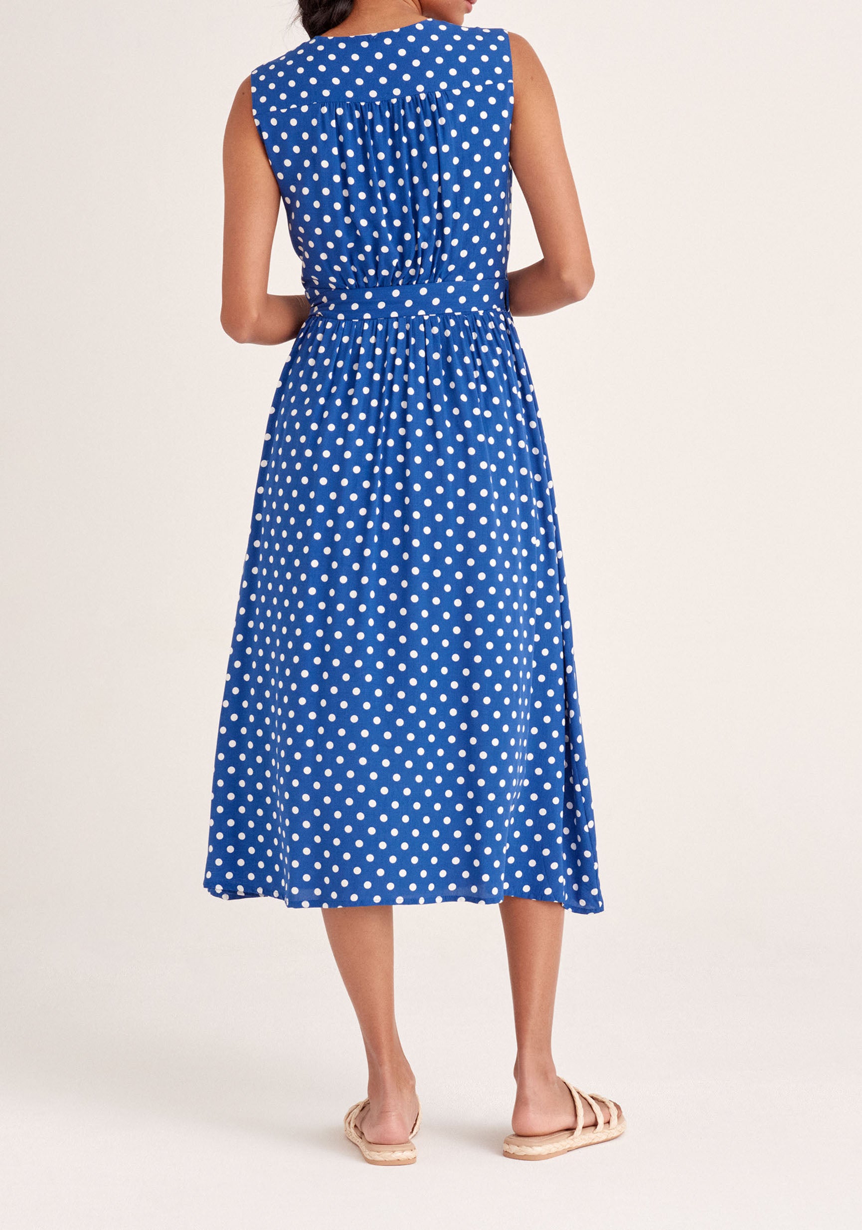 Paisie Sleeveless Polka Dot Wrap Dress in Dark Blue and White Back