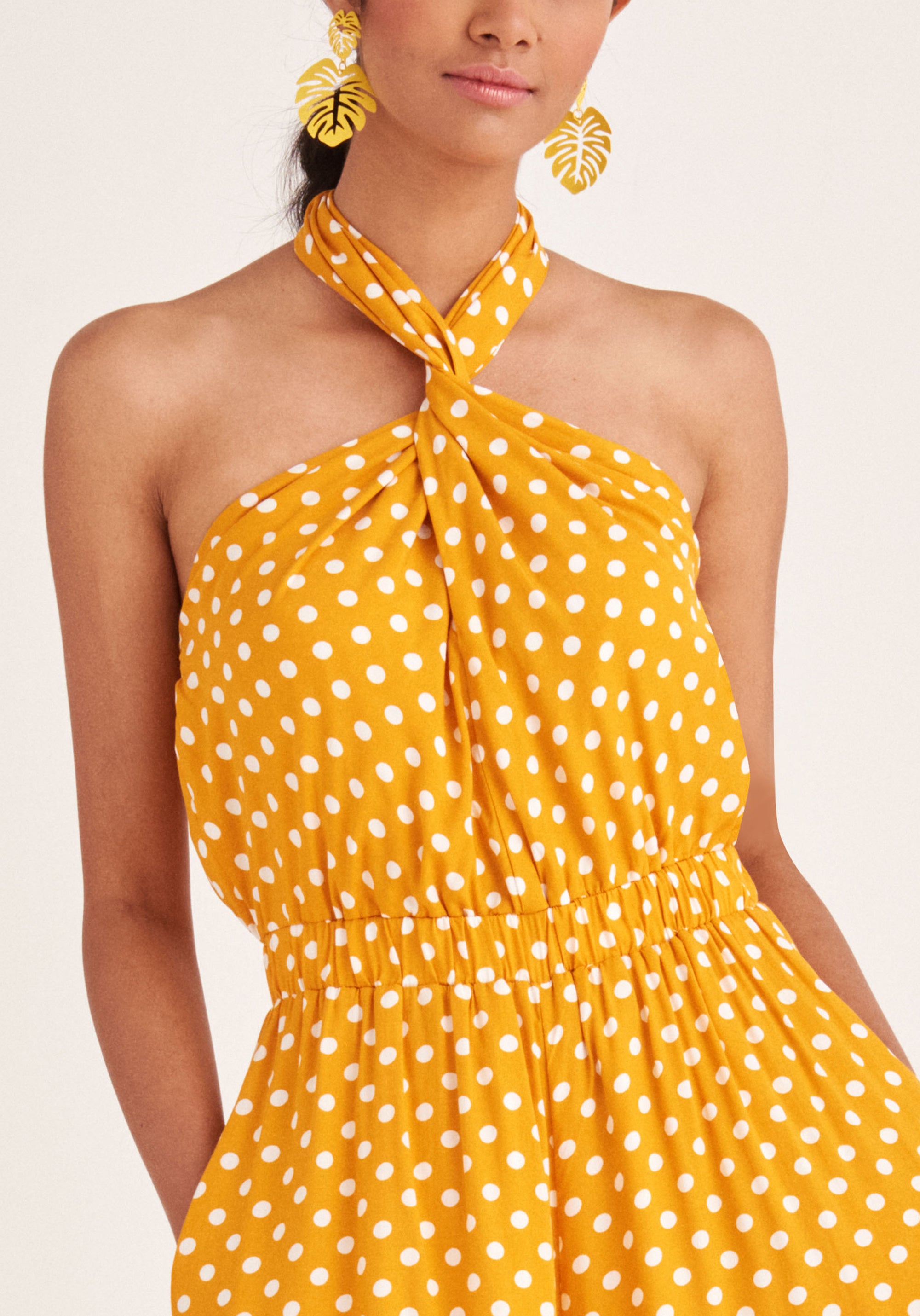 Paisie Polka Dot Halterneck Wrap Jumpsuit in Yellow and White Close Up