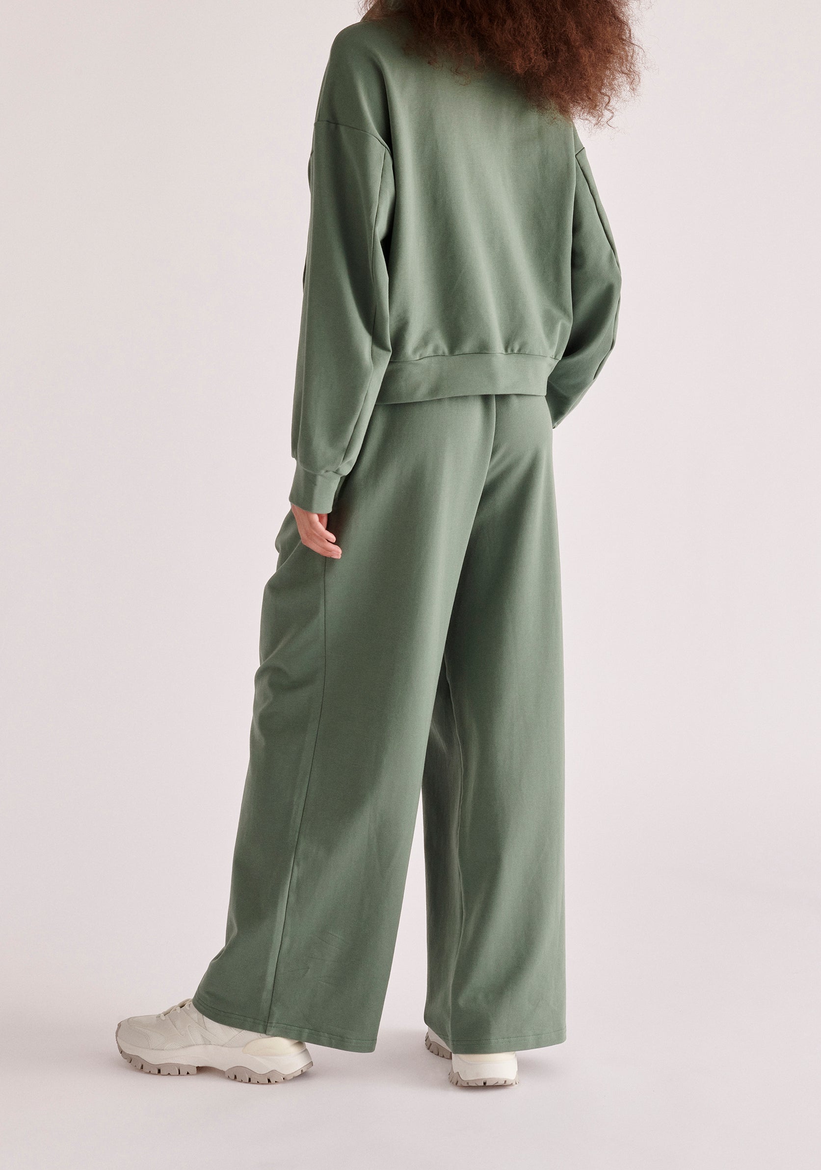 Paisie High Neck Zip Sweatshirt in Green back